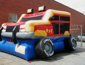 rent a jump house, bounce house, in hueytown, al. shown is a monster truck jump house